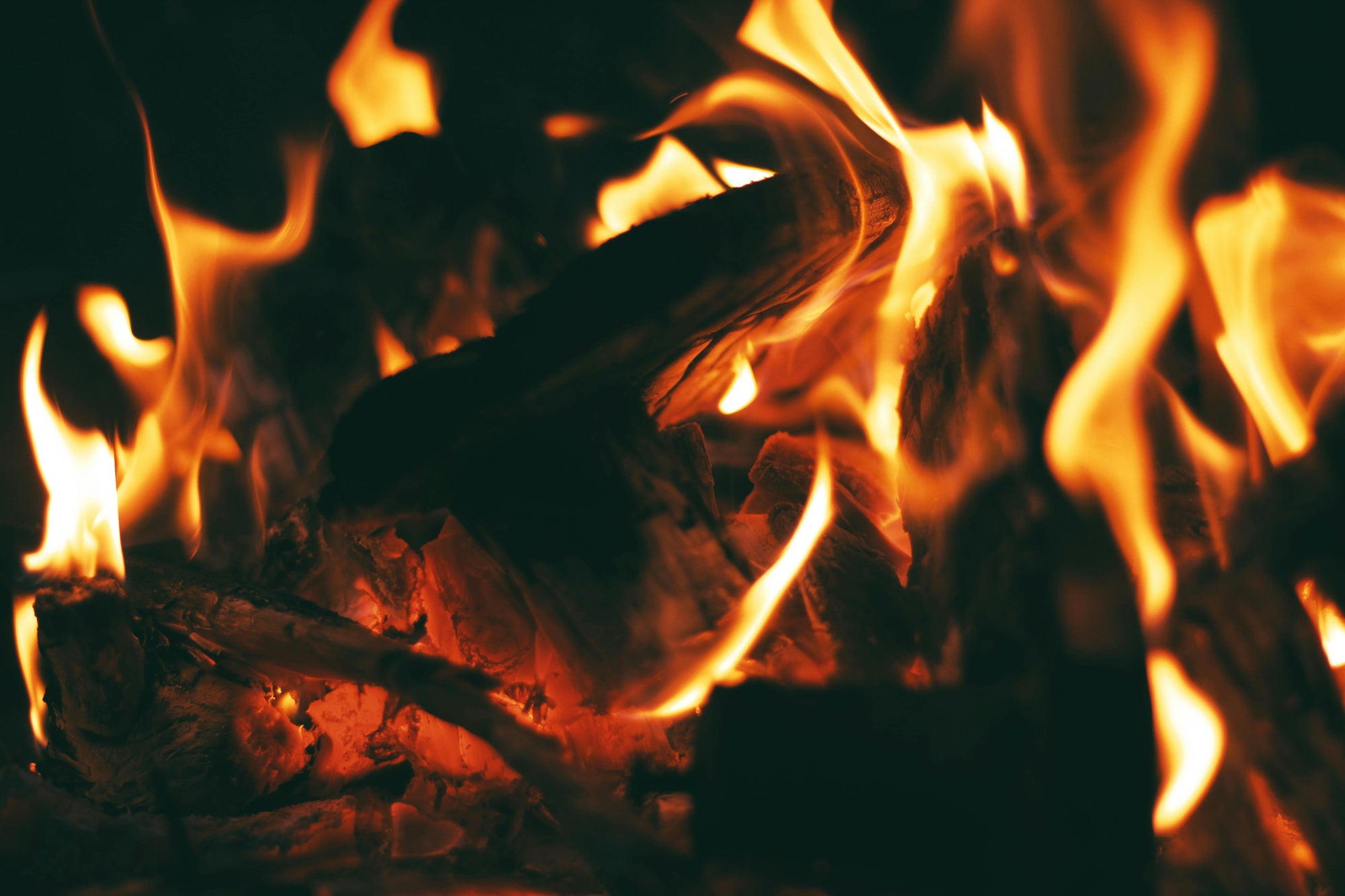 burning logs in a fire pit